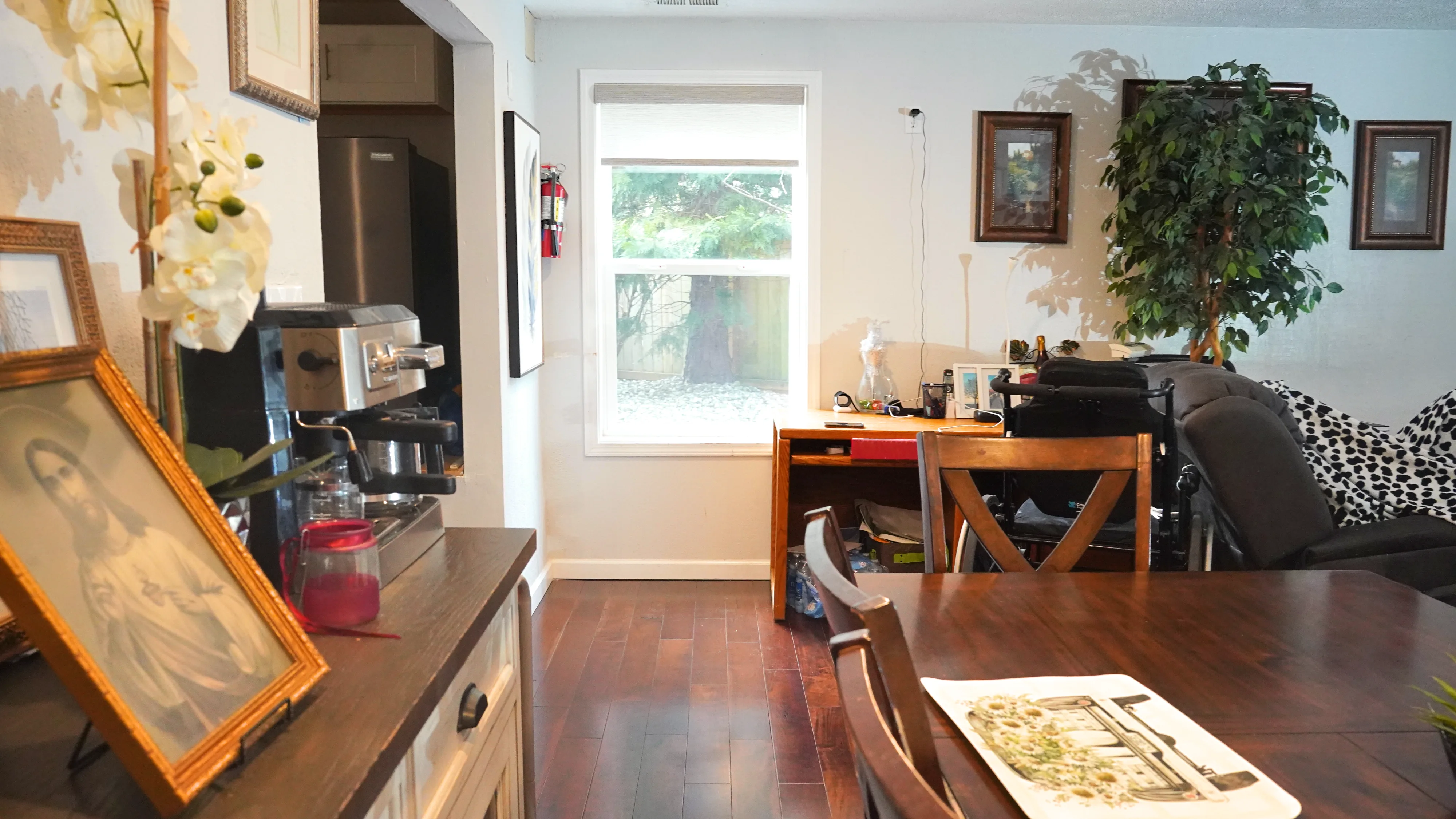 Interior view with coffee station, desk area, and natural light
