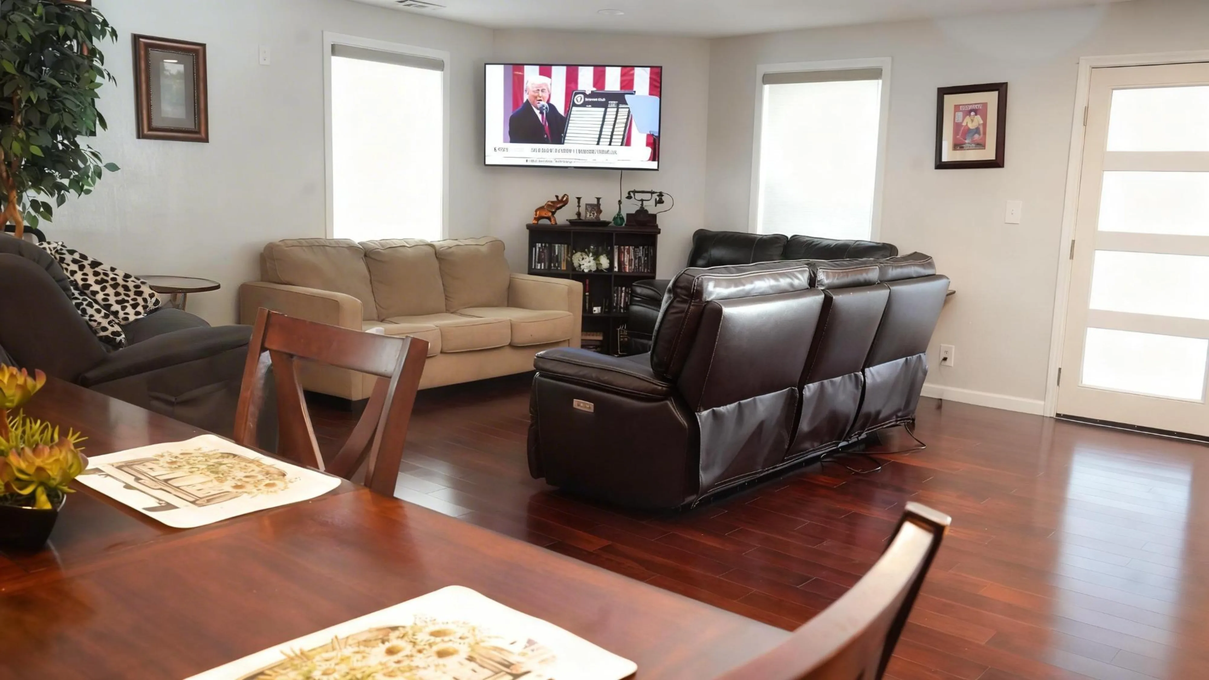 Living room with reclining sofas and wall-mounted television